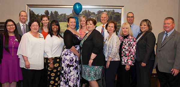 AMITA Health/Alexian Brothers Health System employees who are Harper alumni, with members of the Harper College Alumni Committee.