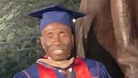 photo of Joshua Emeka Emeruem in graduation cap and gown