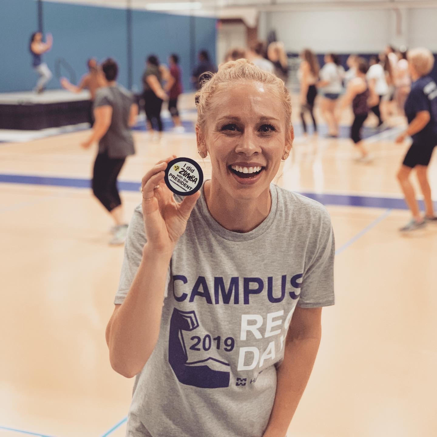 Photo of a person holding a magnet that says "I did Zumba with the President."