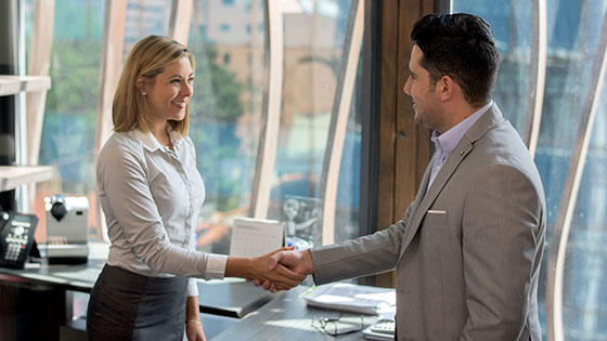 woman and man in professional dress