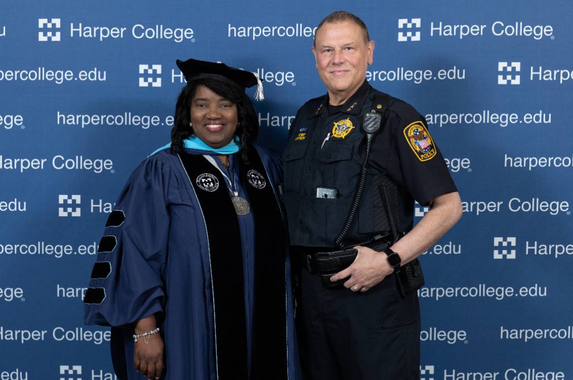 Dr. Proctor with Chief John R. Lawson M.S at graduation.