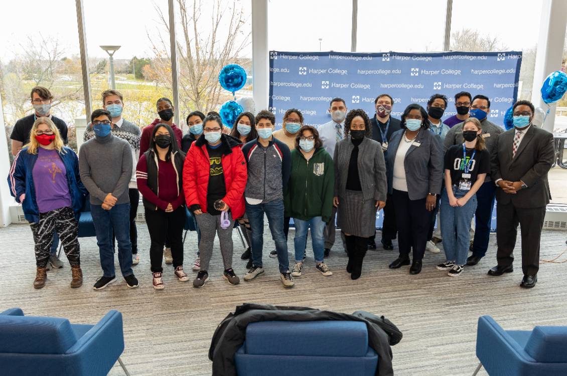 Dr. Avis Proctor with a group of students at an event