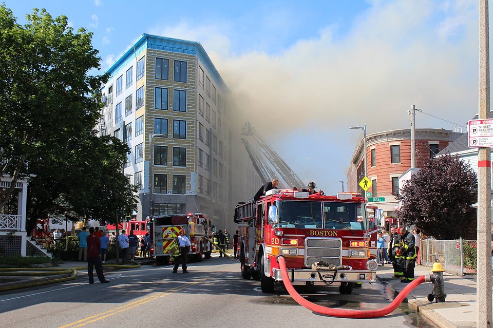 emergency service workers fighting a fire