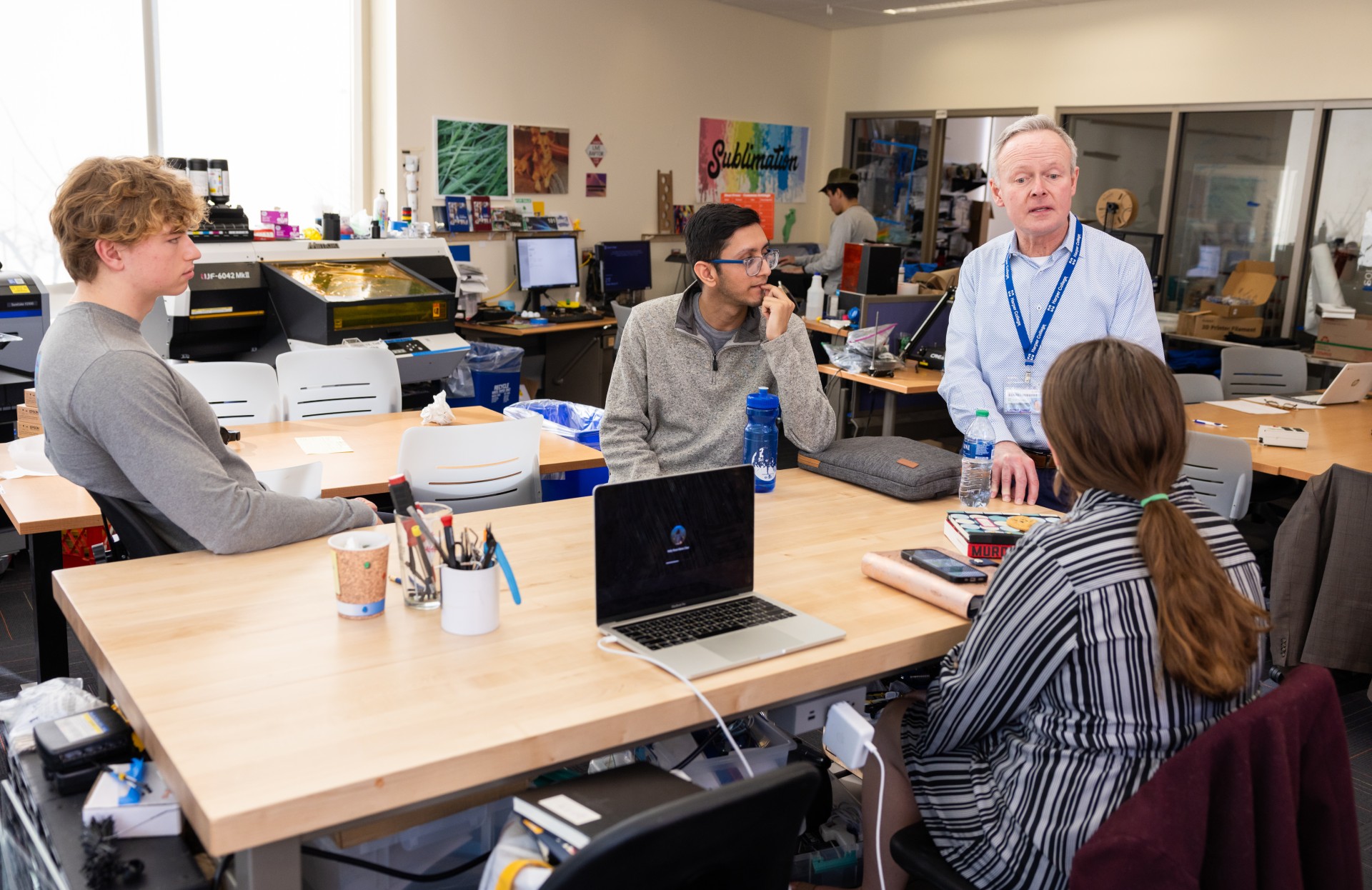 Professor talking to students