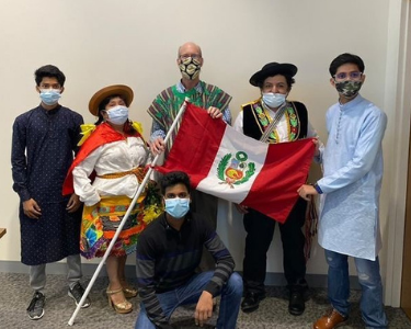 International Students club members with flag of Peru