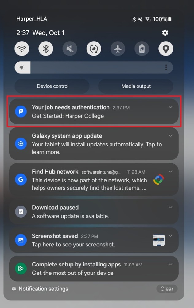 Notification shade showing “Your job needs authentication” alert.