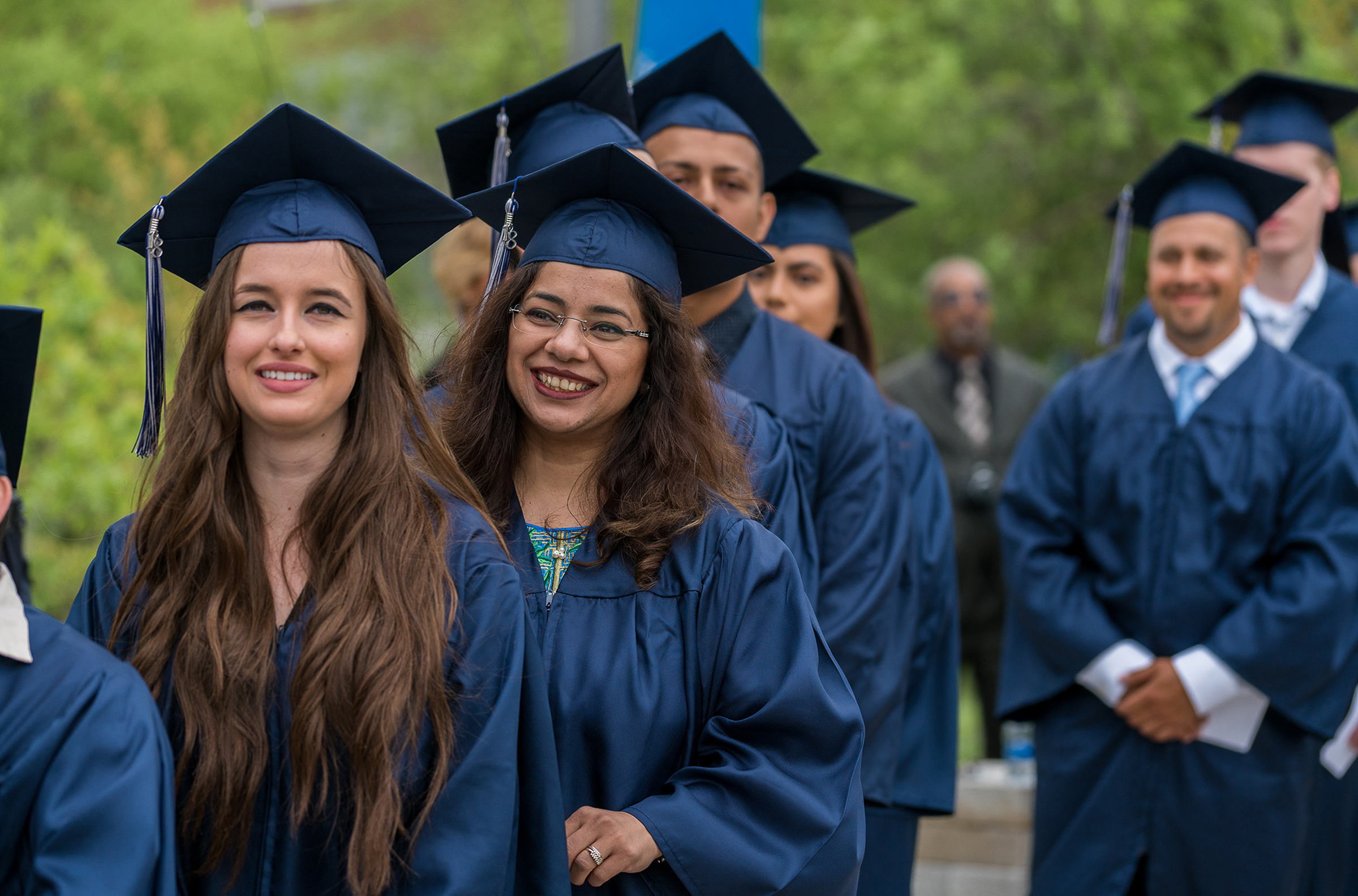Graduates smiling