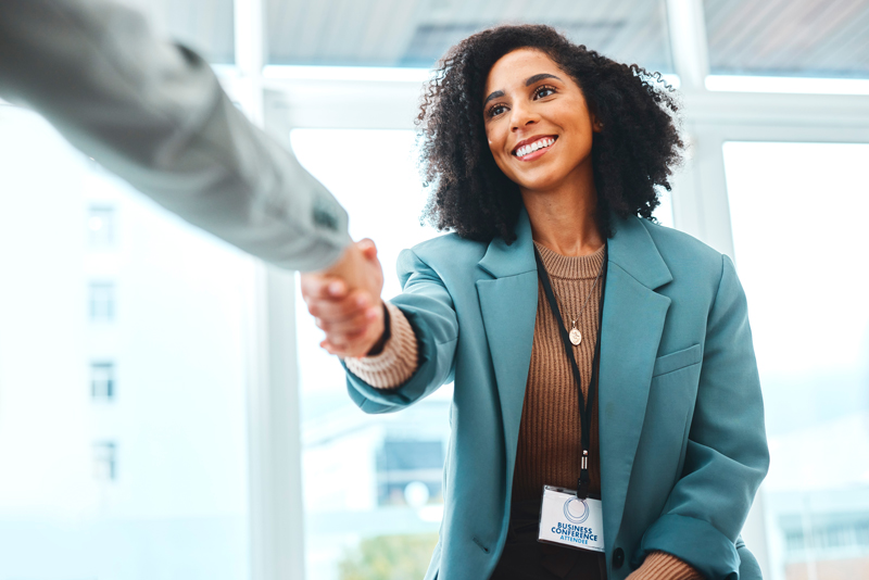 woman shaking a hand