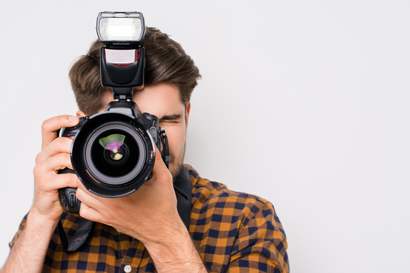 man holding a camera