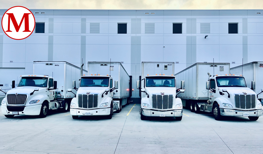 semi trucks lined up in a row