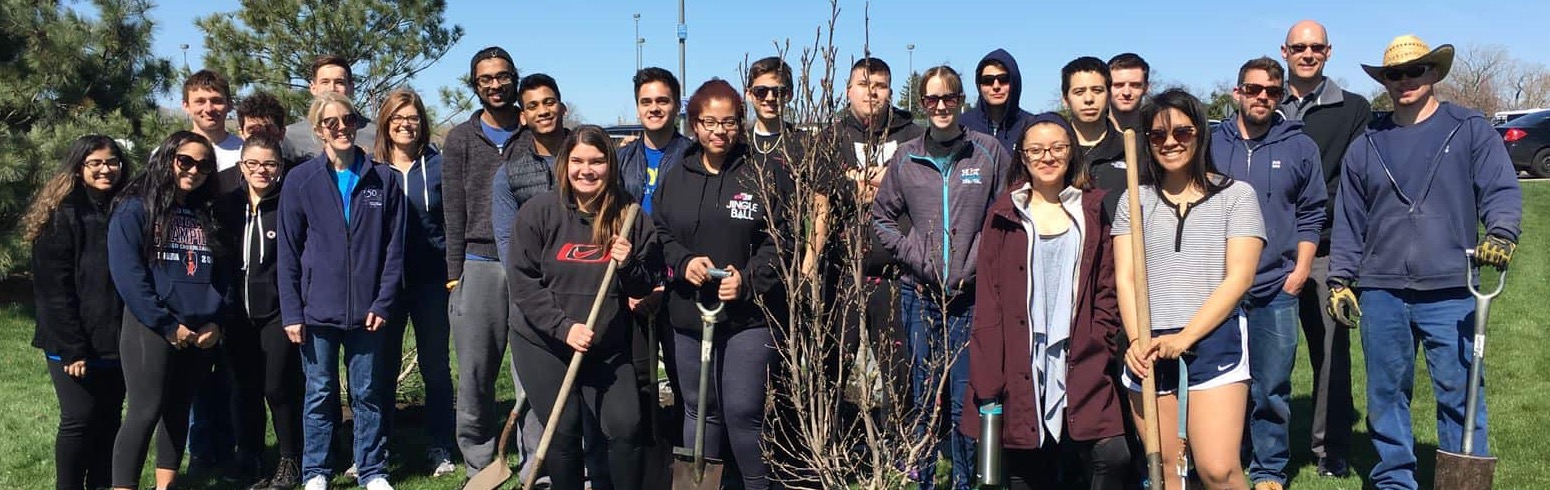 Students, Faculty and Staff pose for yard work photo