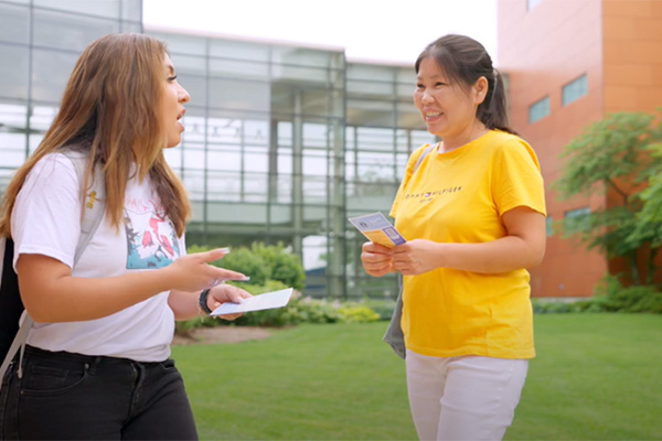 Brianna talks with a friend on campus