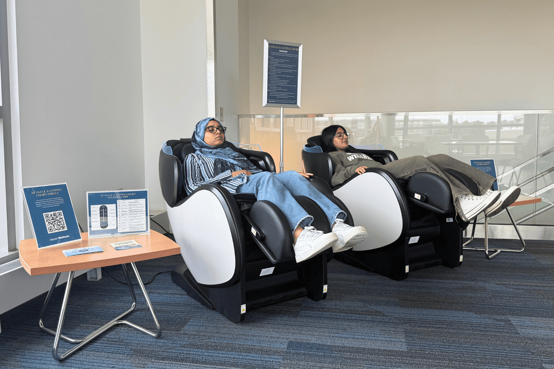 Students using massage and napping chairs